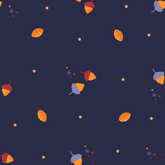 Seamless pattern with autumn leaves and acorns. Autumn pattern with leaves, acorns on a dark blue background. Autumn background for fabric, gift packaging