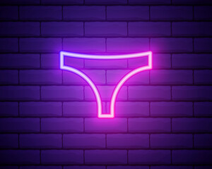 Glowing neon line woman Underwear icon isolated on brick wall background. Vector Illustration