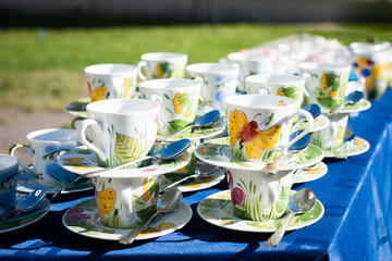 Hand painted butterfly coffee cups. Summer fairytale party theme catering service.