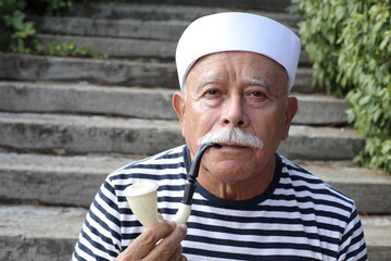 Classic senior sailor with a mustache 