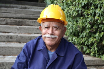 Senior construction worker with a mustache - Powered by Adobe