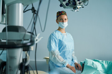 Surgeon in medical uniform working in operating room