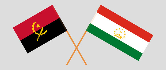 Crossed flags of Angola and Tajikistan. Official colors. Correct proportion
