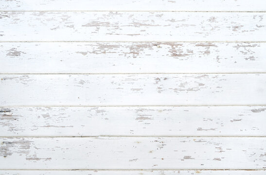 White painted chipped wood texture with flat wooden boards background