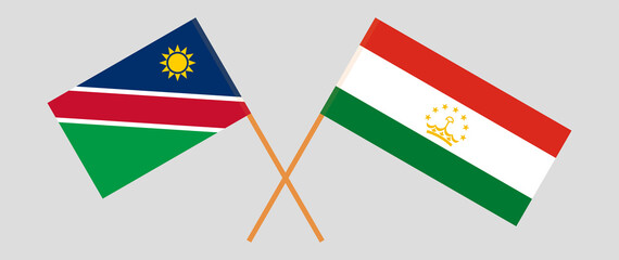 Crossed flags of Namibia and Tajikistan. Official colors. Correct proportion