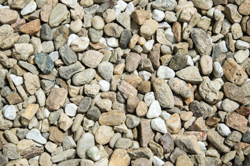 Detail of the ground full of small round stones