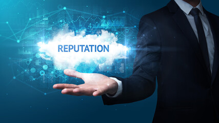 Hand of Businessman holding motivational message