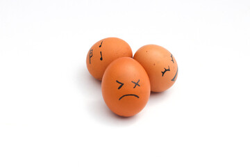 a Group of brown chicken eggs with happy, annoyed, and tired faces isolated on white background.