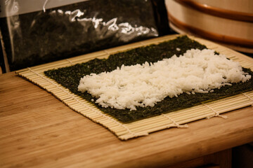 Homemade cucumber sushi roll preparation – in progress 