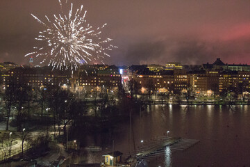 Fireworks at Kungsholmen waterfront at night, Stockholm, Sweden.