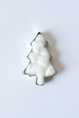 plain cotton ball christmas tree isolated on a light background