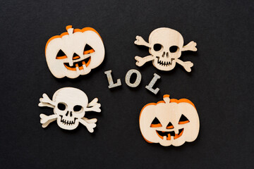 halloween pumpkins and skulls with the message "LOL"