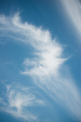 Naklejka na ściany i meble wispy clouds and blue sky