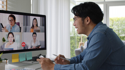 Fototapeta premium Group of asia team people chat online with casual work at home office self learn in job career plan reskill upskill workforce teaching class. Happy smile man study MBA talking on sale report screen.