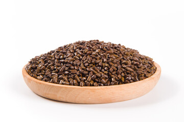 Chinese herbal medicine cassia seeds on white background