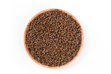 Chinese herbal medicine cassia seeds on white background