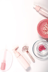 Moisturizer and skincare tools. Wellness concept. gua sha stone, essential oil. Natural skin care