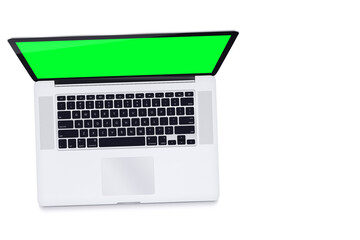 Fototapeta na wymiar Notebook green screen on white background. Chroma Key. Top view.