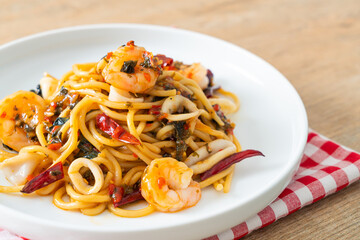 spicy spaghetti seafood on plate