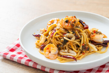 spicy spaghetti seafood on plate