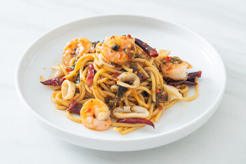 spicy spaghetti seafood on plate