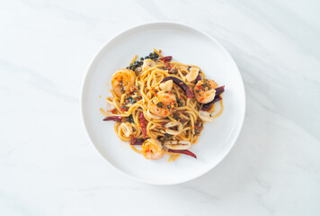 spicy spaghetti seafood on plate