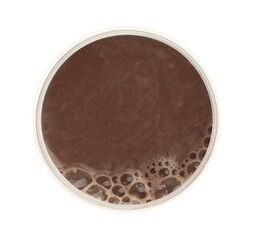 Delicious chocolate milk in glass isolated on white, top view