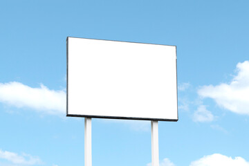 Out door billboard on blue sky background with clipping path