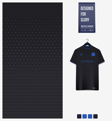 Soccer jersey pattern design. Geometric pattern on black background for soccer kit, football kit or sports uniform. T-shirt mockup template. Fabric pattern. Abstract background. 