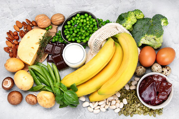 Food high in vitamin B7 on dark background.