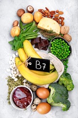 Food high in vitamin B7 on dark background.