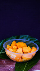 photos of yellow and fresh mangoes, used as product photos for juices or fruit-type foods