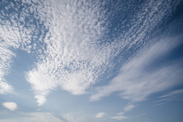 Natural background with blue sky and white clouds.