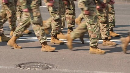 Soldiers in military American army uniform marching military parade