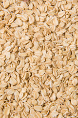 oat flakes or oatmeal texture background