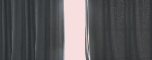 Sunlight enters the room through the curtains