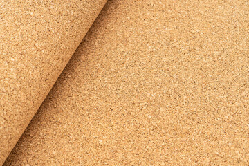 Roll of natural cork used as underlay in flooring. Natural materials in construction.