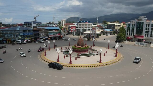 Drone footage above the traffic around the famous statue of Durian in Kampot, south of Cambodia 