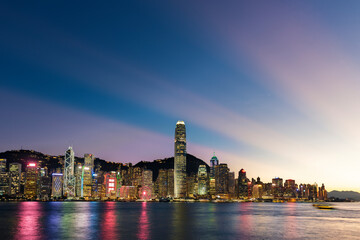 Fototapeta na wymiar Scenery of Victoria harbor of Hong Kong city at dusk