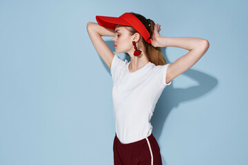 girl in red cap summer clothes fashion decoration posing