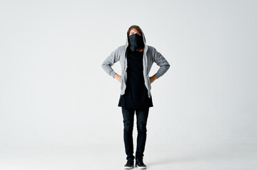 man with a hood on his head anonymity theft crime