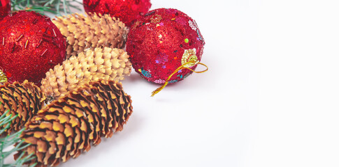 Christmas composition. red decorations, bumps on white background. Flat lay, top view, copy space