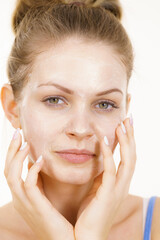 Girl with cream moisture cosmetic on face