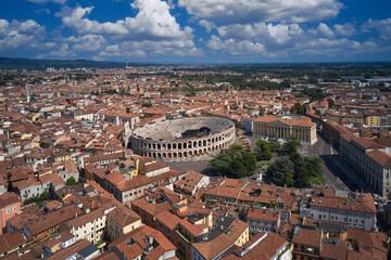 Fototapeta premium Verona, Italy aerial view of the historic city. Aerial panorama of Piazza Bra in Verona. Monument to Unesco Arena di Verona top view. Famous amphitheater in Italy aerial view.
