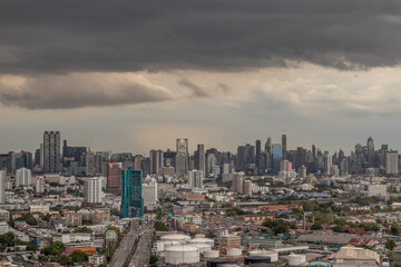 Fototapeta na wymiar Bangkok, thailand - May 28, 2020 : Sky view of Bangkok with skyscrapers in the business district in Bangkok in the evening beautiful twilight give the city a modern style. Selective focus.
