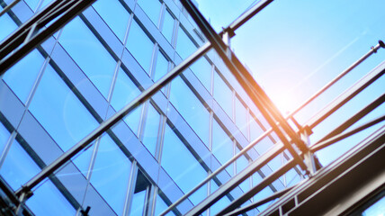 Fragment of glass and metal facade walls. Commercial office buildings. Abstract modern business architecture.
