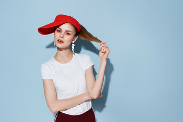 cheerful young woman in red cap fashion summer style Glamor studio