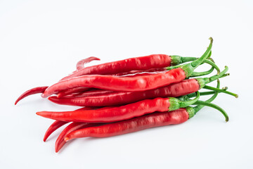 Fresh red peppers on white background