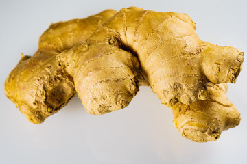 Closeup of fresh root ginger on plate