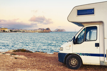 Motor home on sea shore, Spain